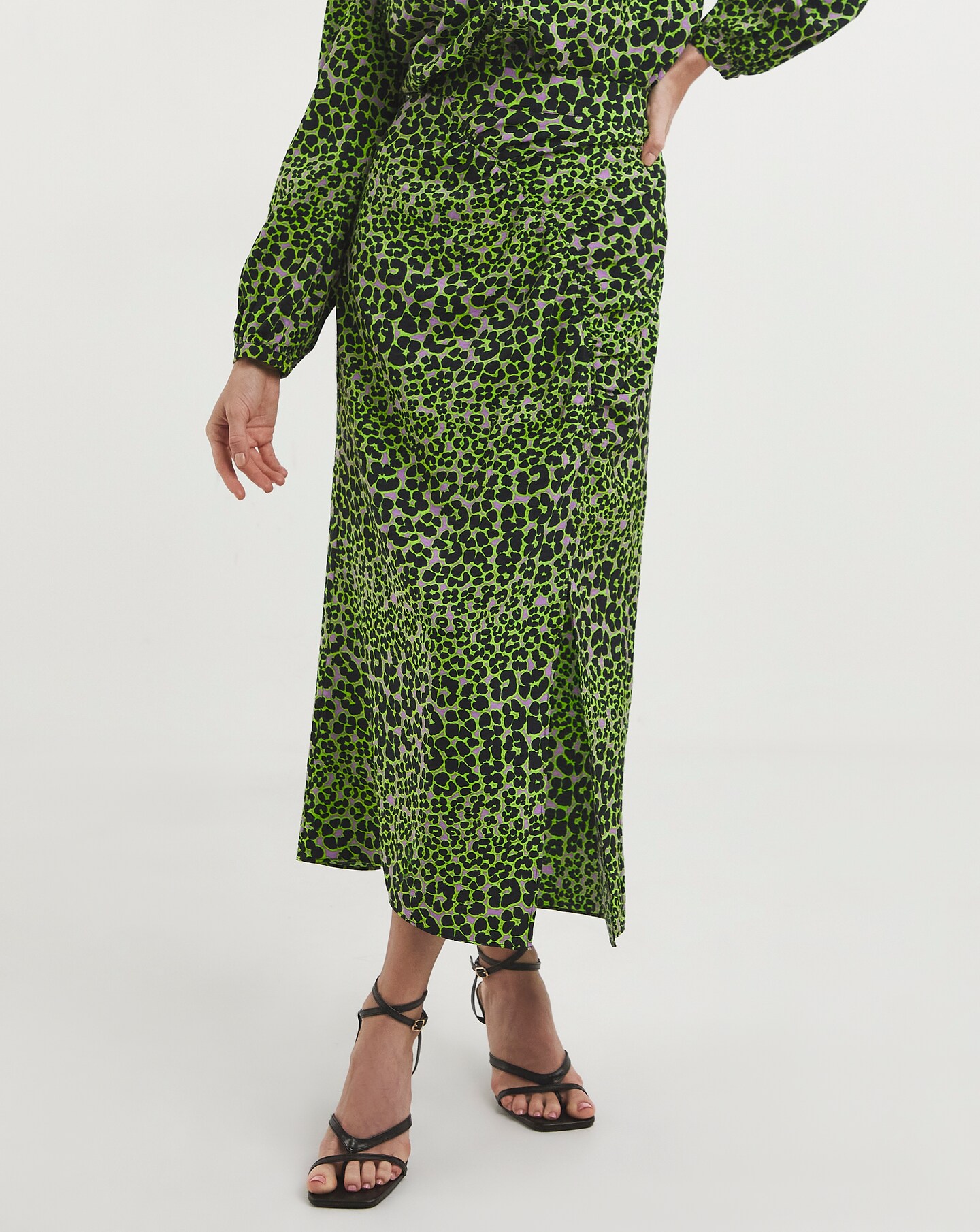 Mid length leopard skirts crossword clearance clue